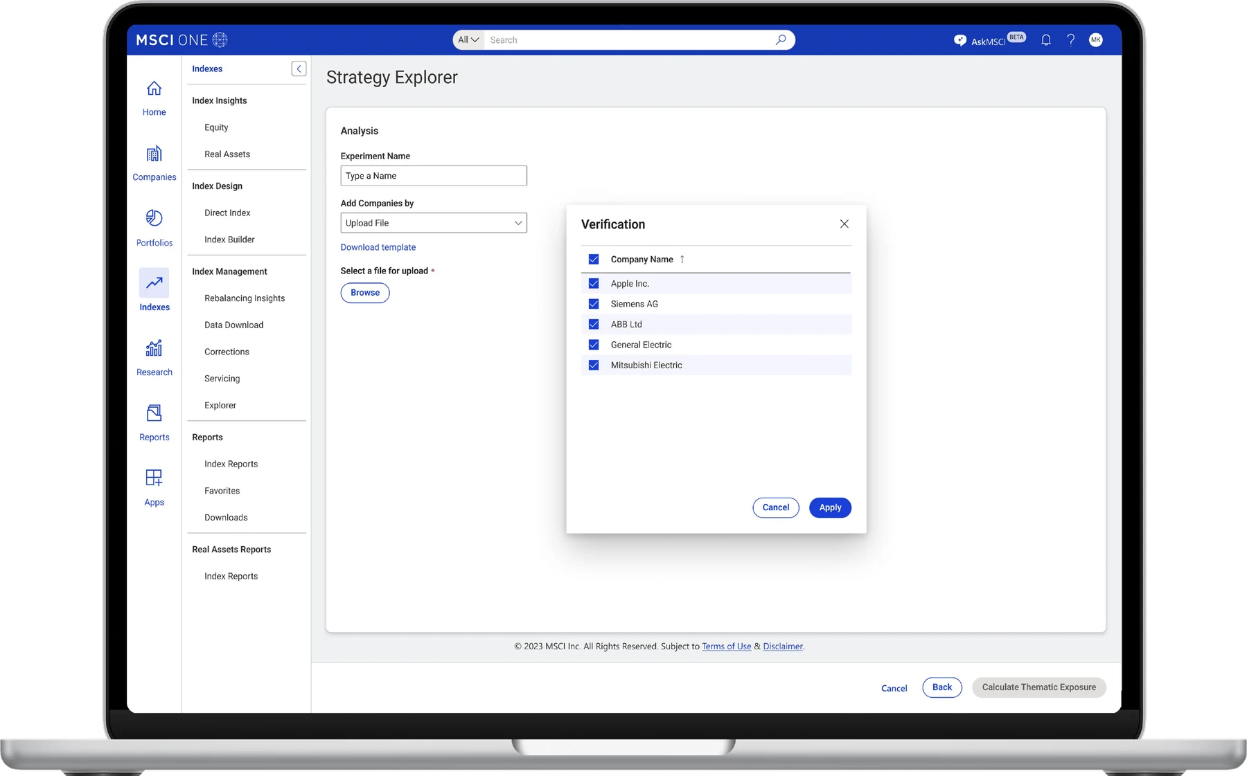 Laptop showing the experiment setup with a verification dialog listing uploaded companies